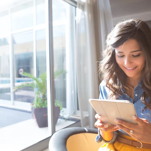 Co-parent reading message on tablet
