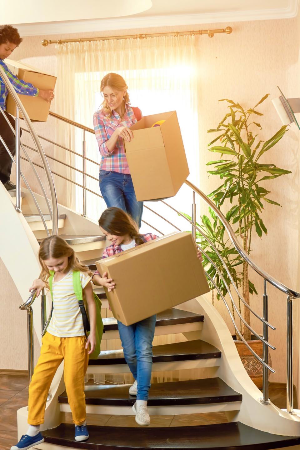 A family gets ready to move to a new home.