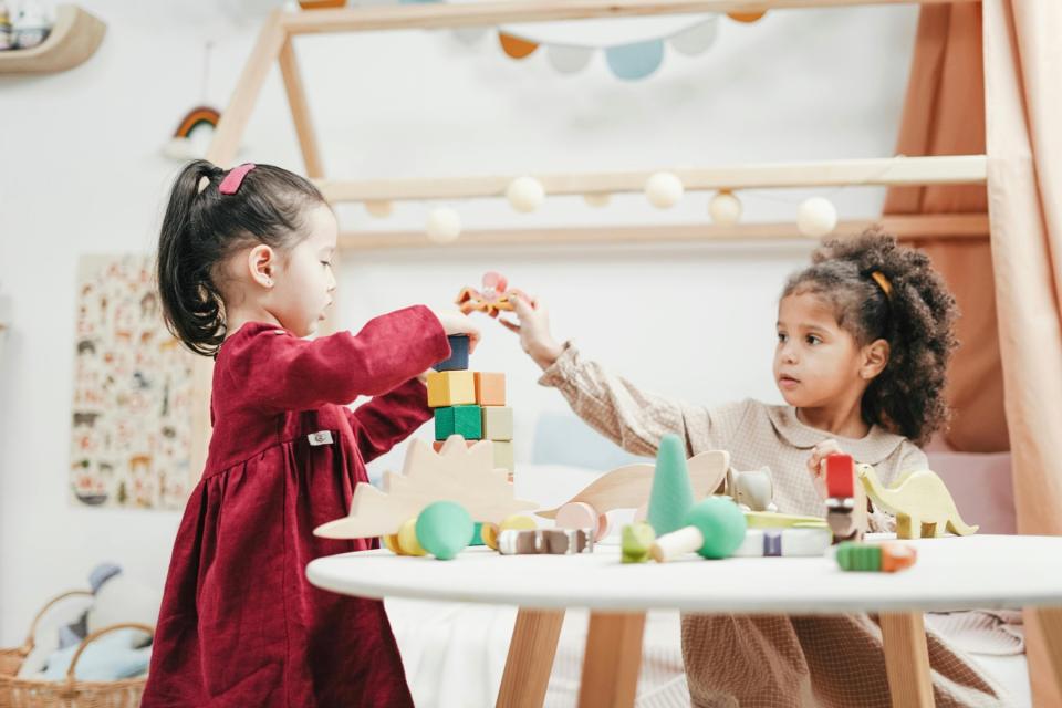 Two little girls playing at daycare